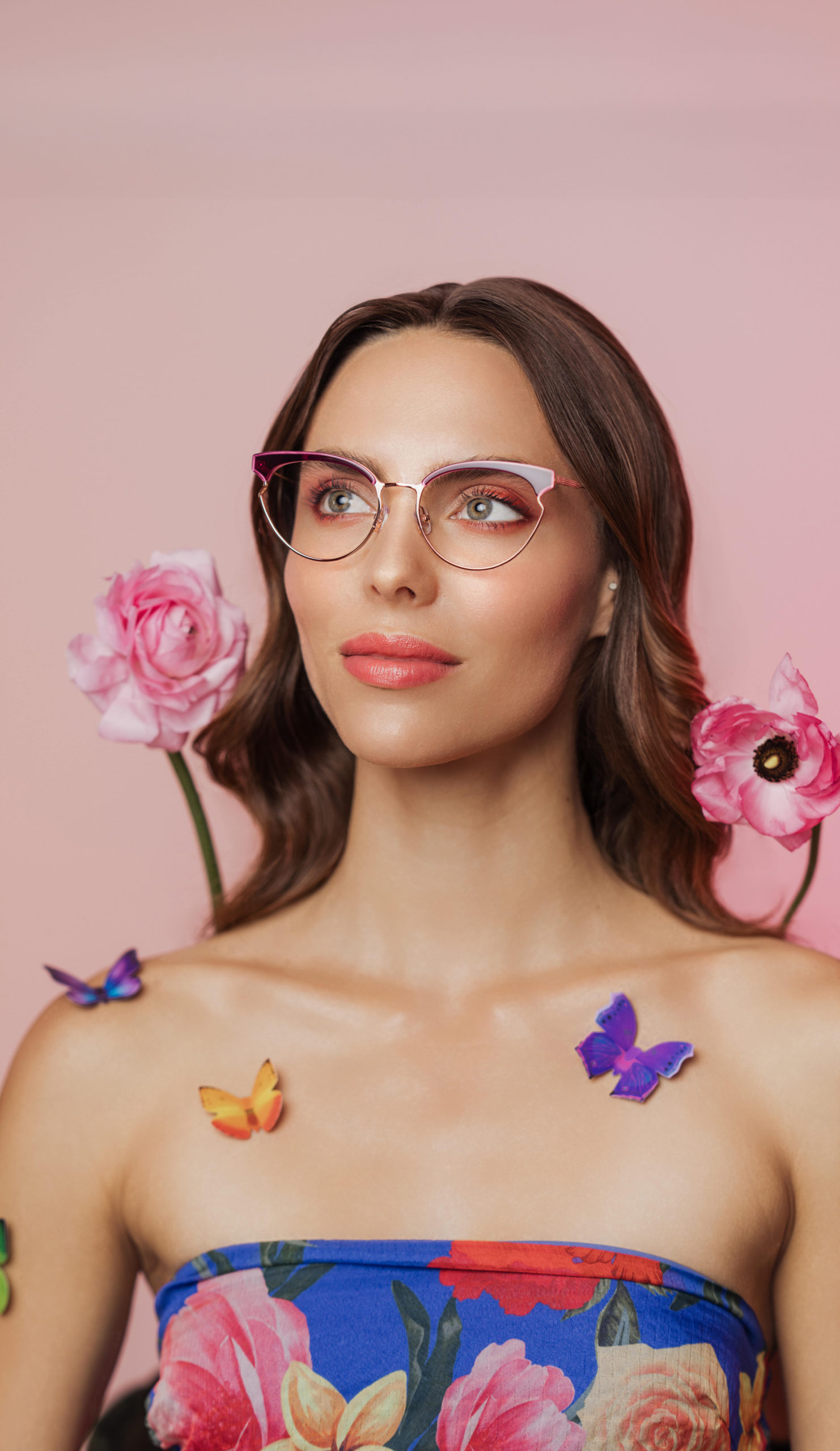 Woman on pink background modeling RACHEL Rachel Roy collection frames